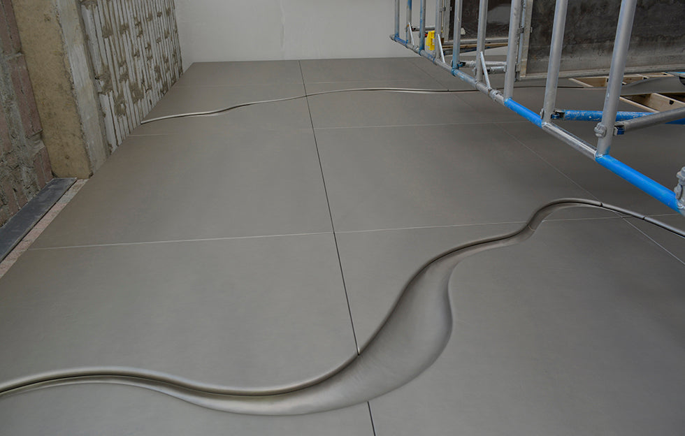 Installing a leather wall in the ‘Dublin Landings’ development with GEM Joinery.