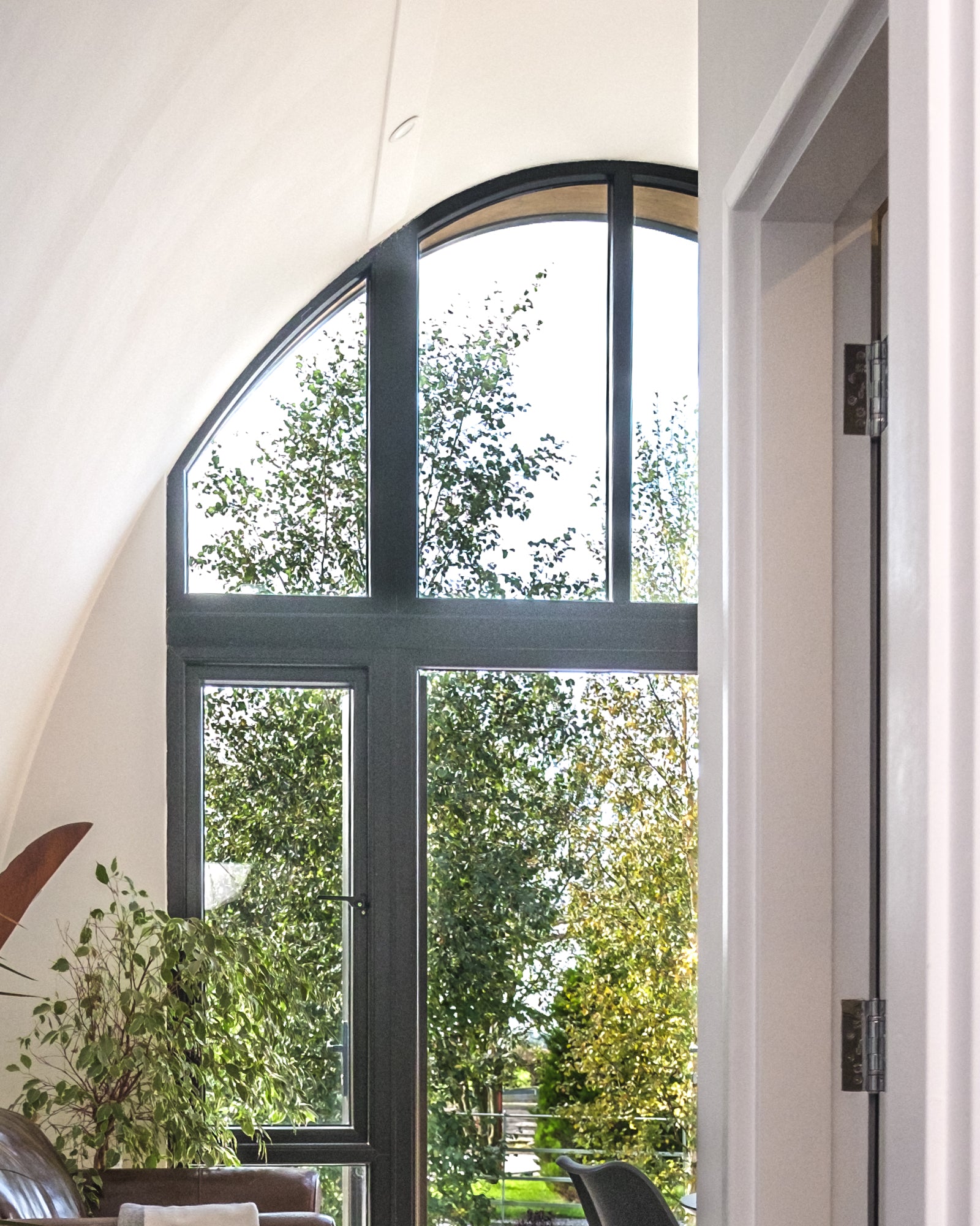 The feature window meeting the high ceiling of the prefab modular garden home. A 30 square meter dwelling made in Ireland