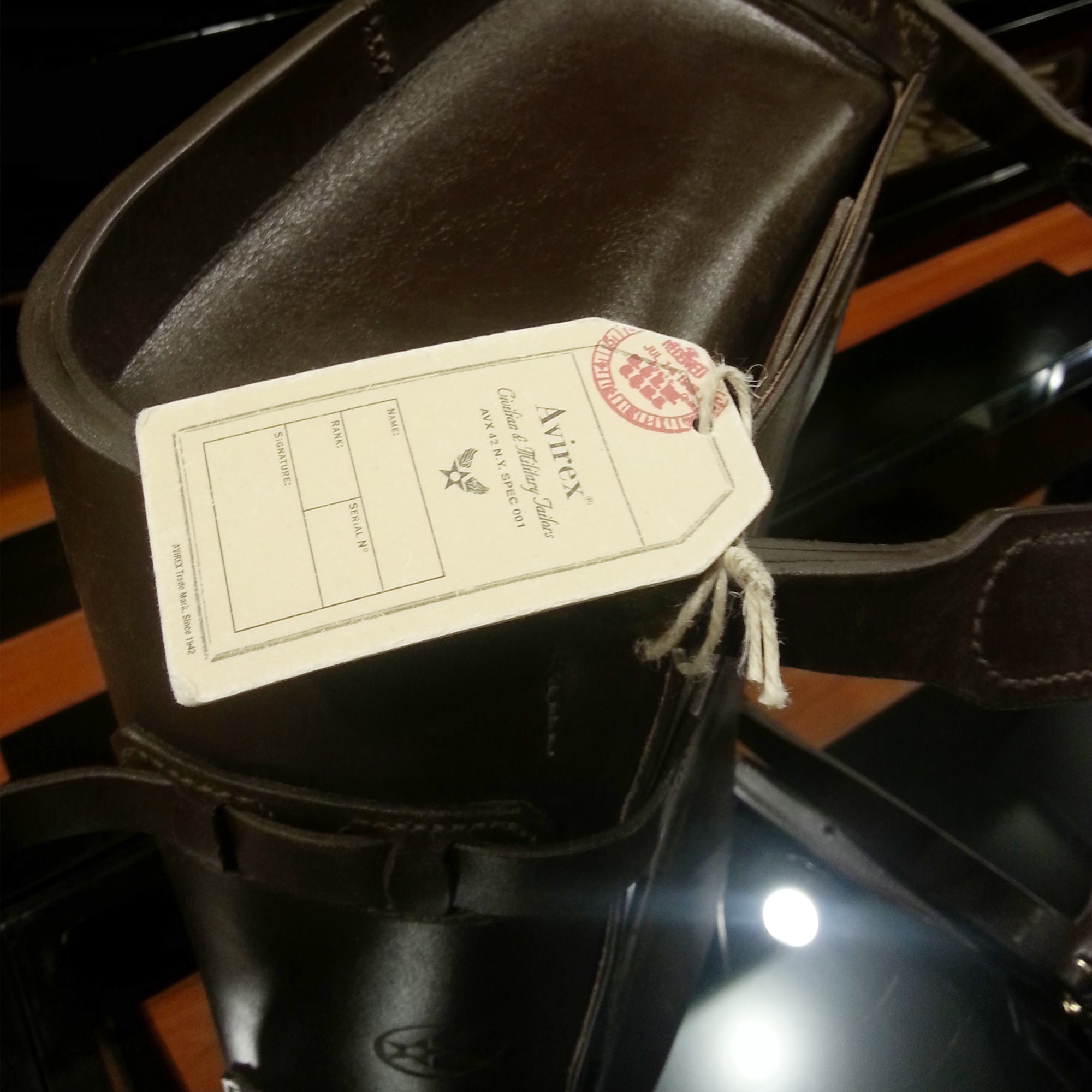 The DE BRUIR Parachuter backpack for sale in an Avirex store in Milan.