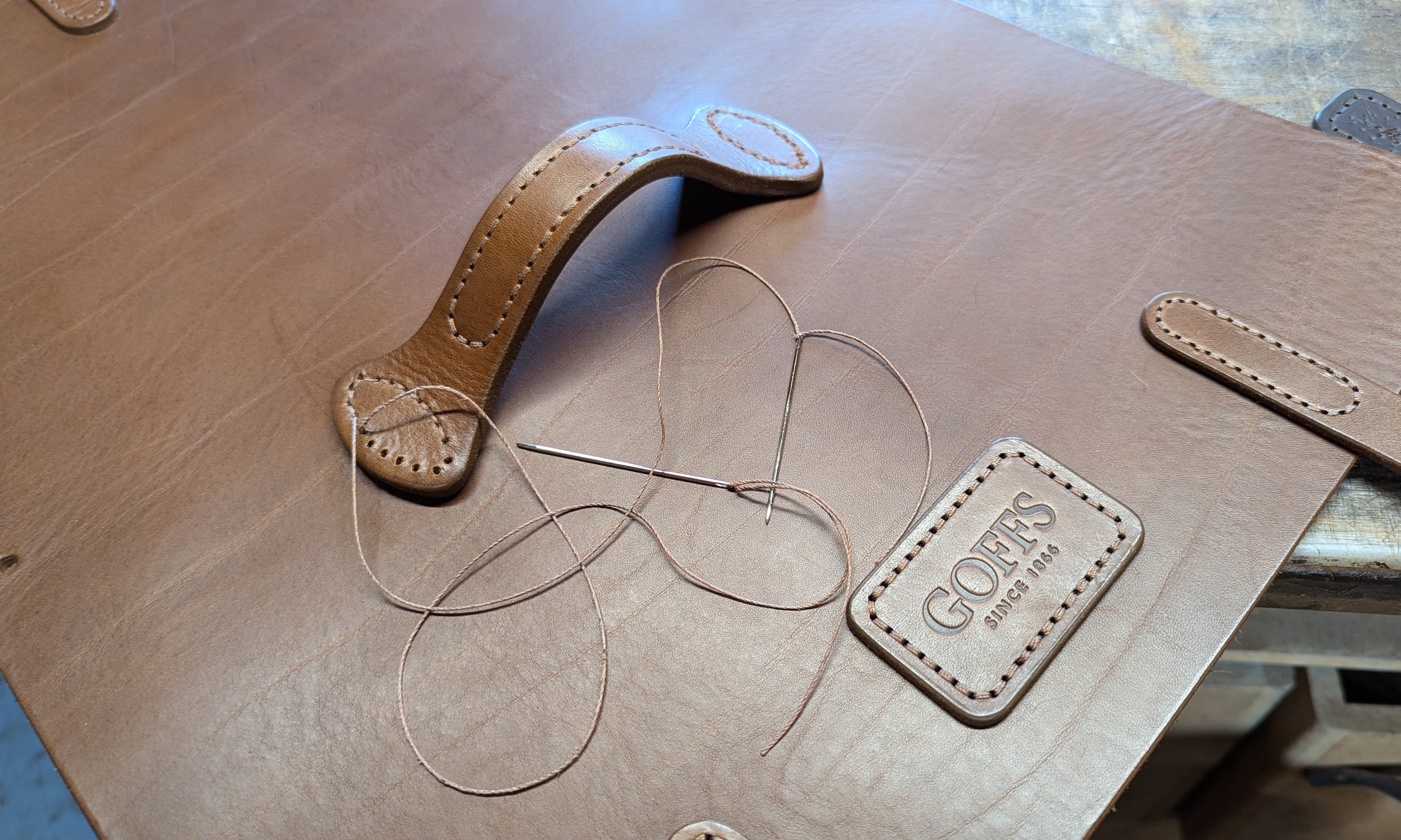Hand-stitched Irish handmade leather bag with GOFFS branding for corporate gifts
