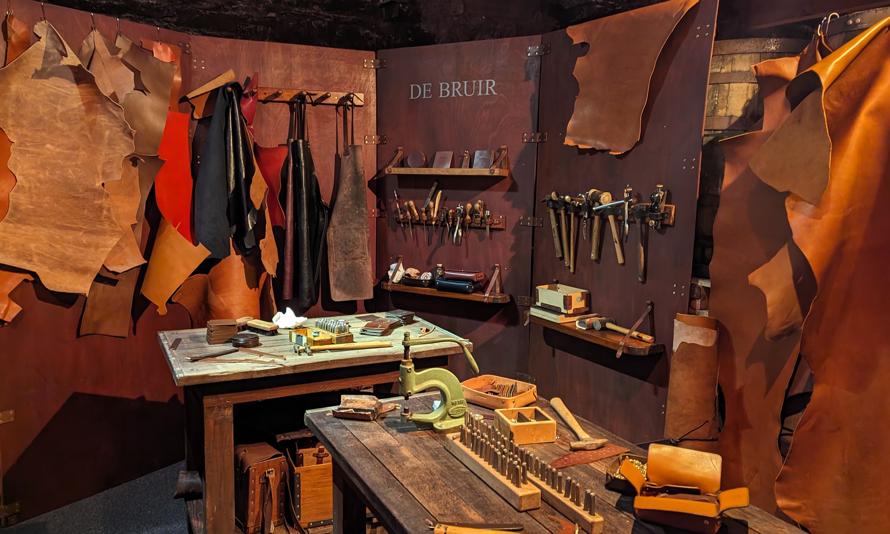 Handcrafted Irish leather pop-up interactive workshop at a Jameson corporate event in Dublin, featuring tools and leather for guests to learn and create