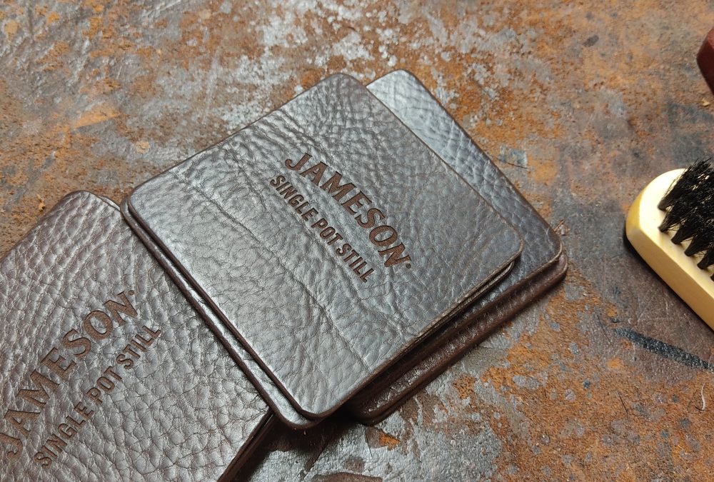 Premium handcrafted leather coasters embossed with Jameson Single Pot Still logo for corporate gifting and hospitality use