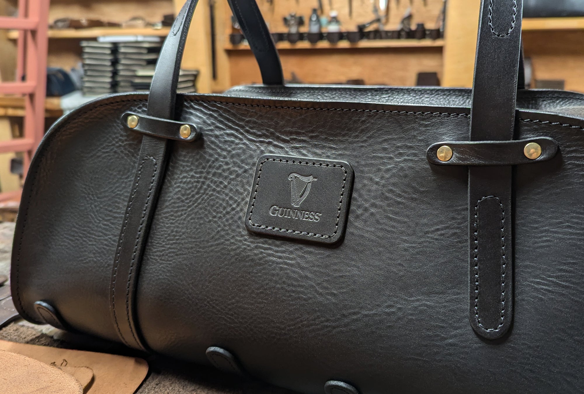 Irish handmade leather sports bag with Guinness branding for luxury corporate gifts