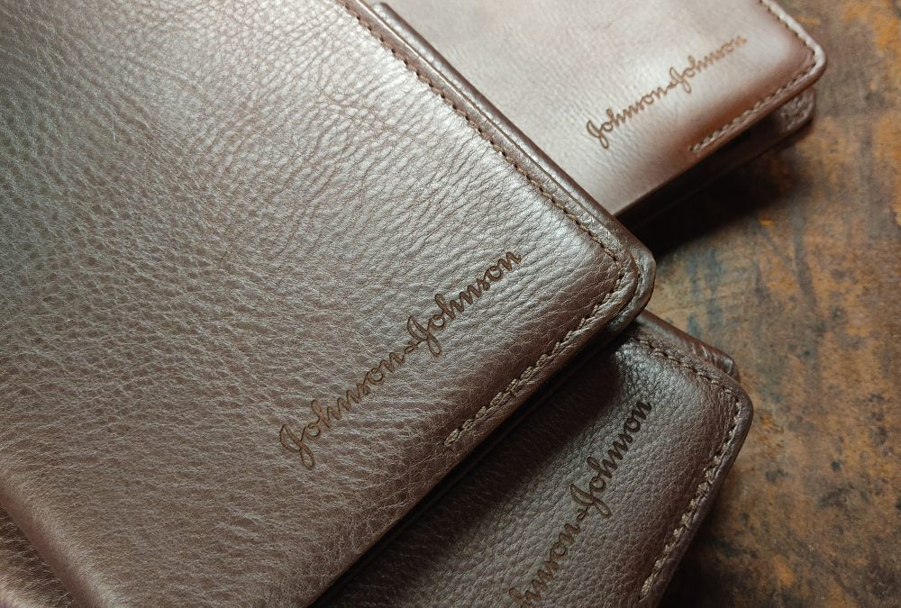 Personalised Irish handmade leather notebooks with Johnson & Johnson branding for corporate gifts
