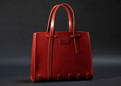 Red leather handbag